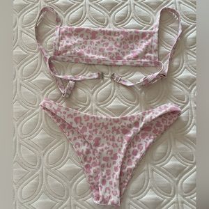 Pink and white leaped animal print bikini set.